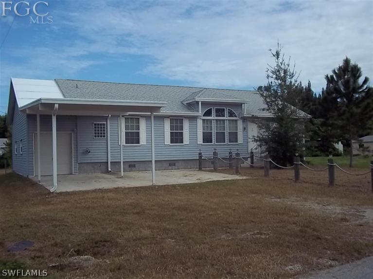 5952 Mackerel Road Bokeelia, FL 33922 - Photo 1 of 11 Gallery Image 1