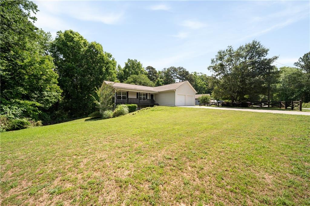 921 Pace Road Hiram, GA 30141 - Photo 27 of 41 a view of a house with a yard
