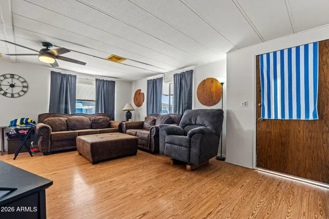a living room with furniture and a window