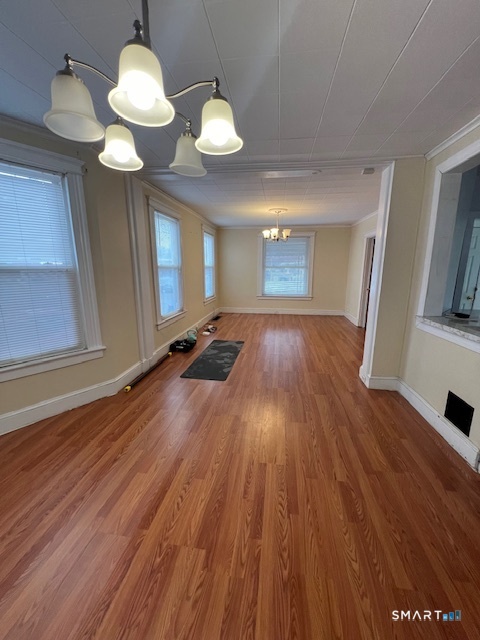 16 Byron Street Waterbury, CT 06704 - Photo 2 of 6 a view of a livingroom with wooden floor