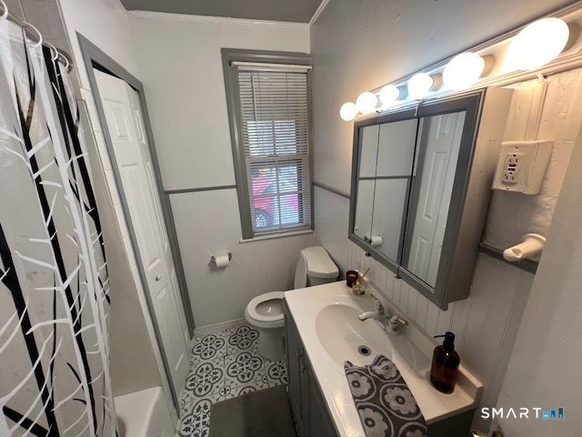 16 Byron Street Waterbury, CT 06704 - Photo 4 of 6 a bathroom with a sink mirror vanity and toilet