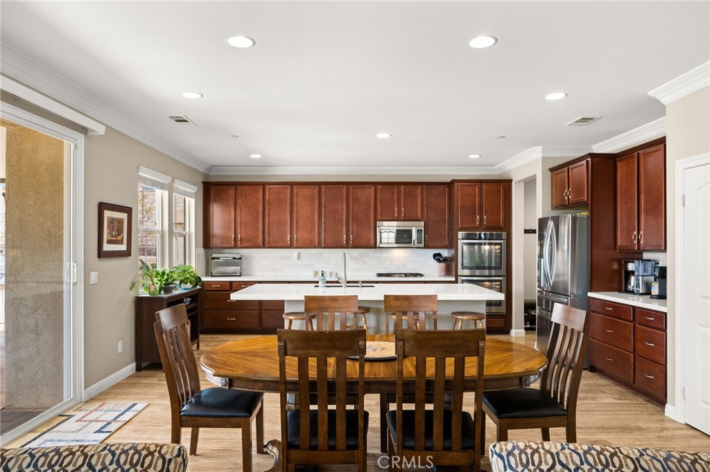 4976 Golden Ridge Place Rancho Cucamonga, CA 91739 - Photo 19 of 56 Dining room can fit a table that seats 14 people comfortably