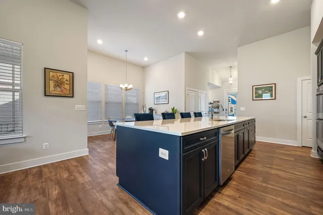 a kitchen with counter top space and sink