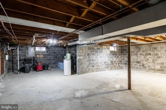 a front view of house with yard and trees