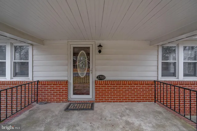 a view of a porch with a door