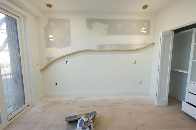 a view of a hallway with closet