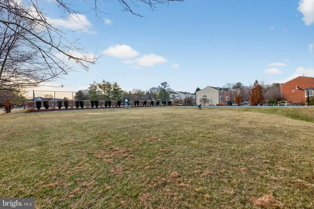 a view of a building with traffic signal