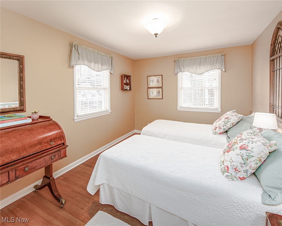 696 Ecton Road Akron, OH 44303 - Photo 21 of 41 The second bedroom at the front corner of the home, featuring the refinished hardwood floors, two windows and a large closet.