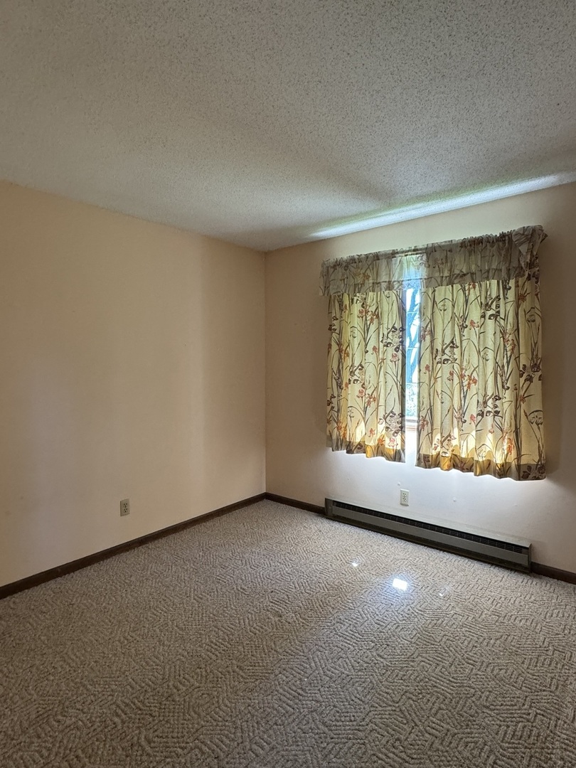 3222 250 East Road Herscher, IL 60941 - Photo 20 of 31 an empty room with a large window