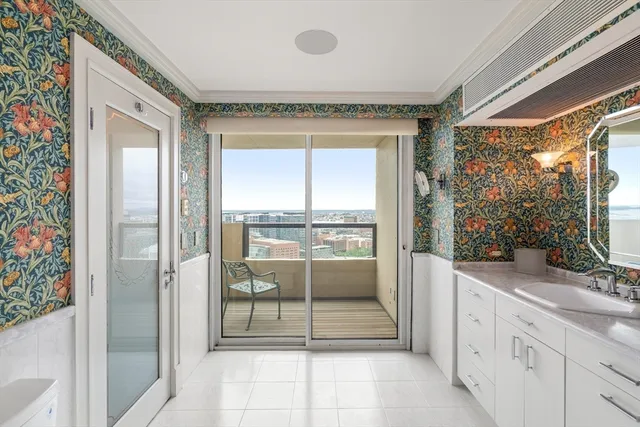 a spacious bathroom with a mirror and a shower