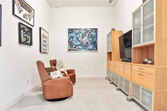 a living room with furniture and window