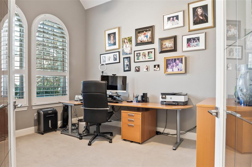 2109 Georgetown Boulevard Prosper, TX 75078 - Photo 22 of 40 a view of a workspace with furniture and a window