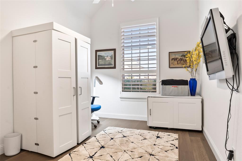 2109 Georgetown Boulevard Prosper, TX 75078 - Photo 24 of 40 a room with a window and wooden floor