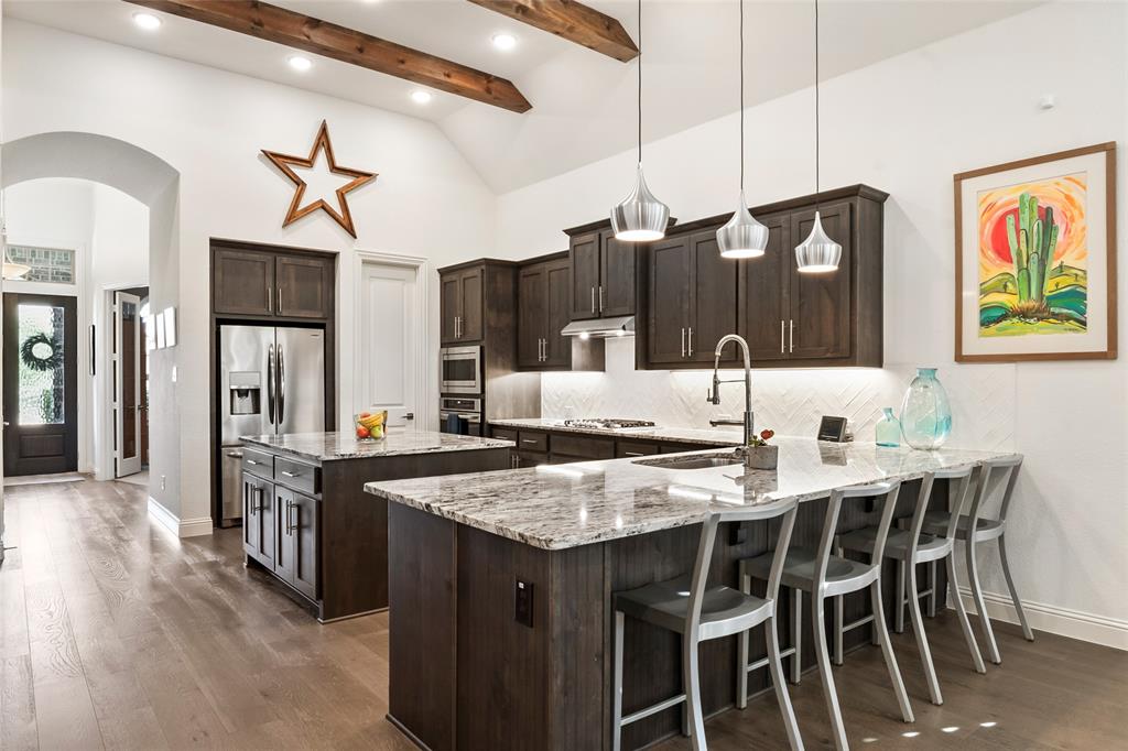 2109 Georgetown Boulevard Prosper, TX 75078 - Photo 4 of 40 a view of a dining room with furniture