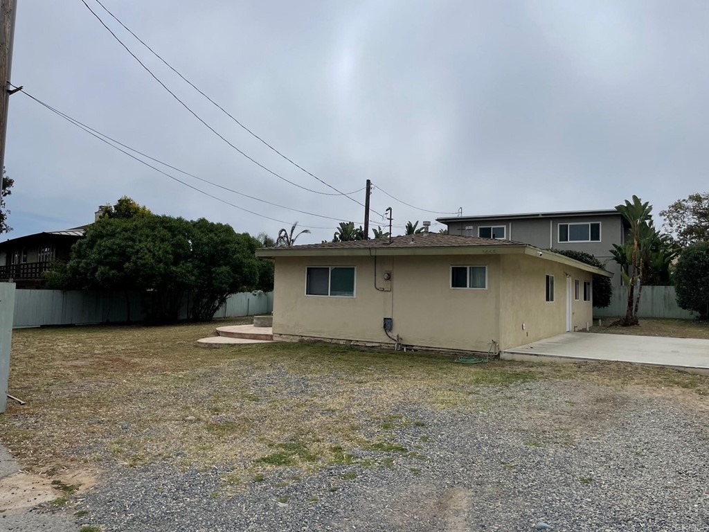 1465 Neptune Avenue Encinitas, CA 92024 - Photo 12 of 13 a view of a house with a garage
