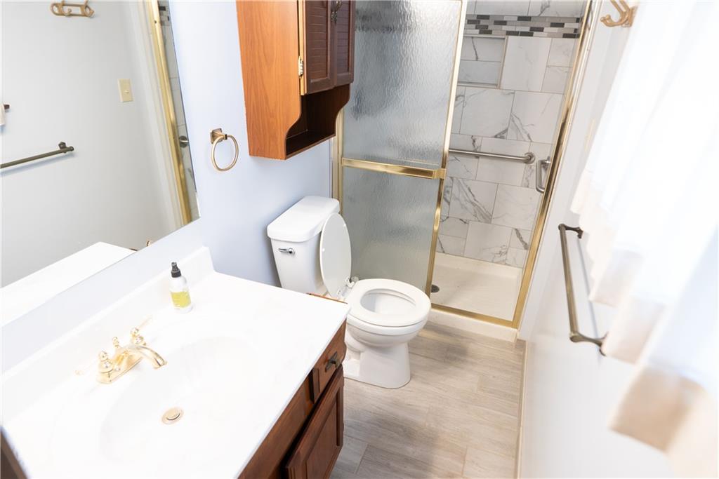 3565 Tuscarawas Road Beaver, PA 15009 - Photo 14 of 37 a bathroom with a sink and toilet