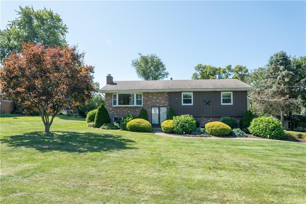 3565 Tuscarawas Road Beaver, PA 15009 - Photo 2 of 37 a view of a house with a yard and plants