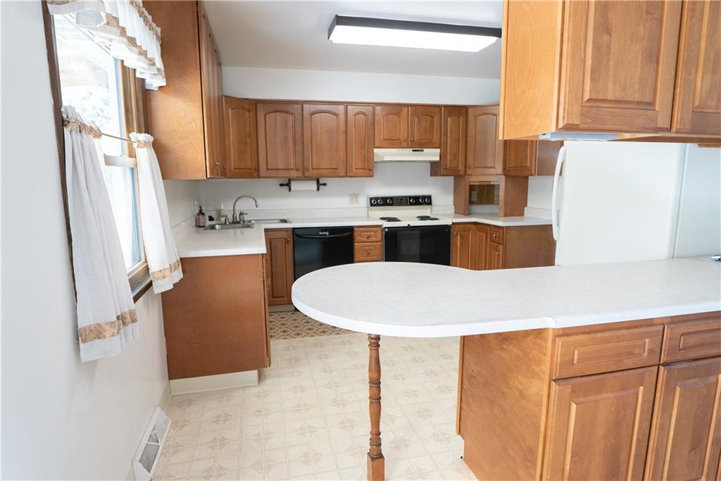 3565 Tuscarawas Road Beaver, PA 15009 - Photo 6 of 37 a kitchen with stainless steel appliances granite countertop a sink stove and refrigerator