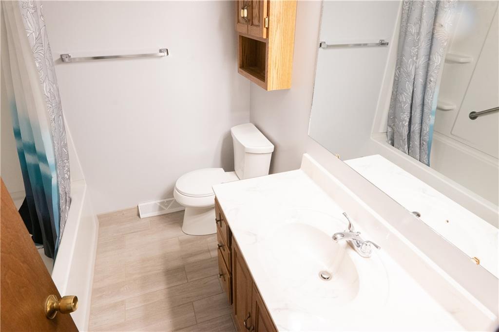 3565 Tuscarawas Road Beaver, PA 15009 - Photo 10 of 37 a bathroom with a bathtub shower sink and toilet