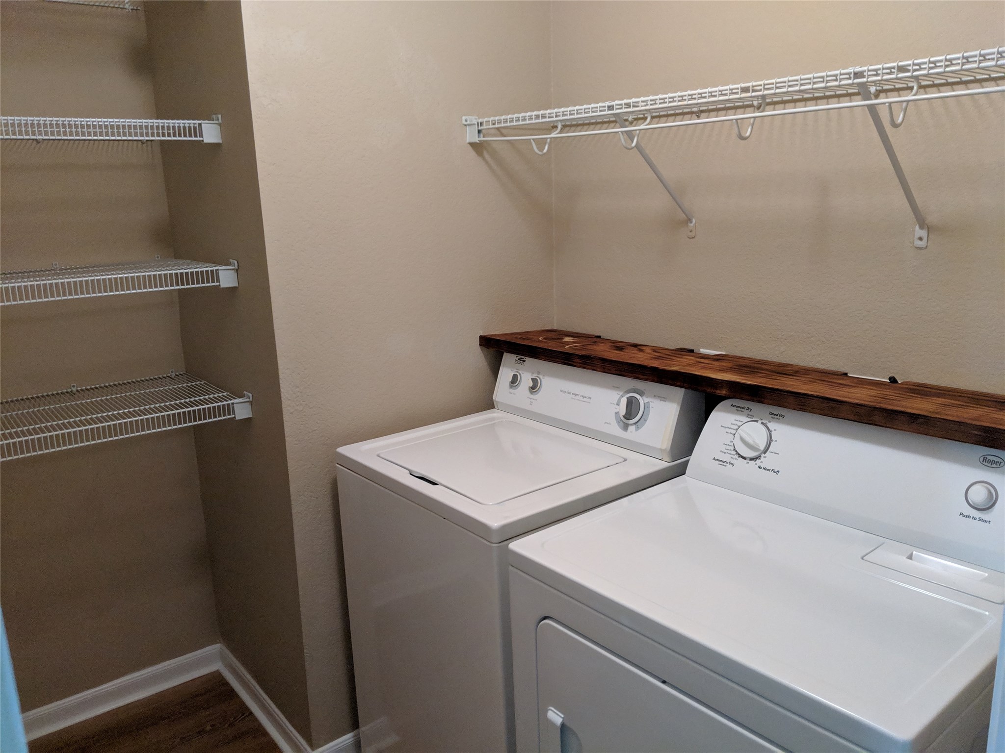 21210 Shadow River Lane Spring, TX 77379 - Photo 16 of 21 a utility room with dryer and washer