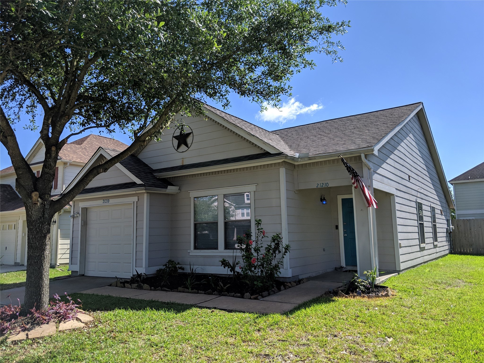 21210 Shadow River Lane Spring, TX 77379 - Photo 2 of 21 a front view of a house with a yard