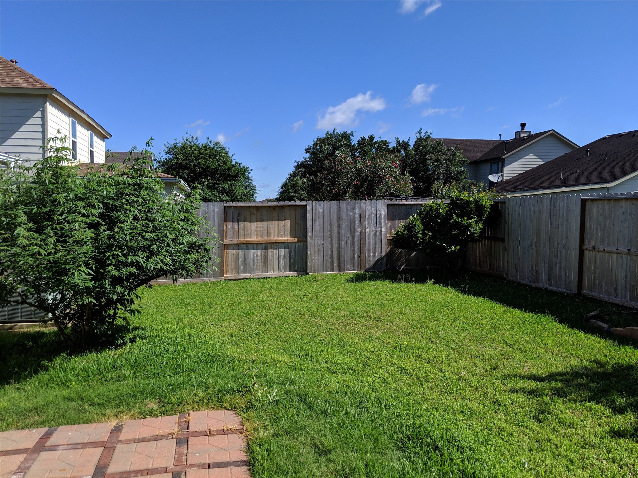 21210 Shadow River Lane Spring, TX 77379 - Photo 21 of 21 a backyard of a house with lots of green space