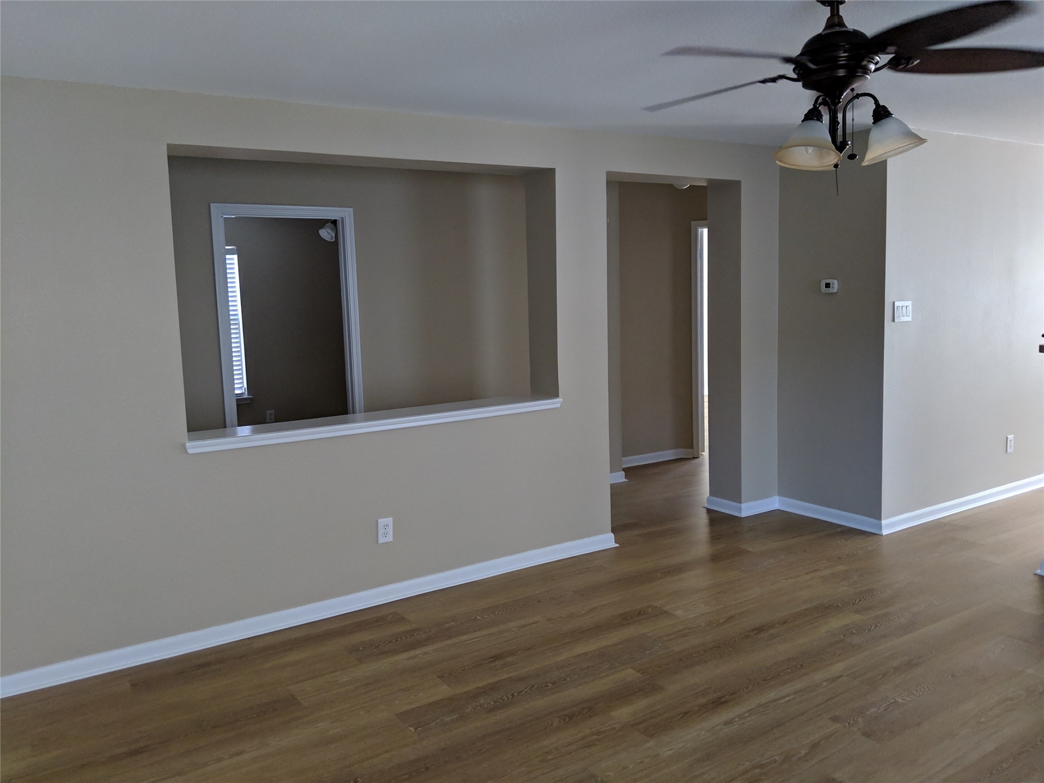 21210 Shadow River Lane Spring, TX 77379 - Photo 4 of 21 a view of an empty room with wooden floor