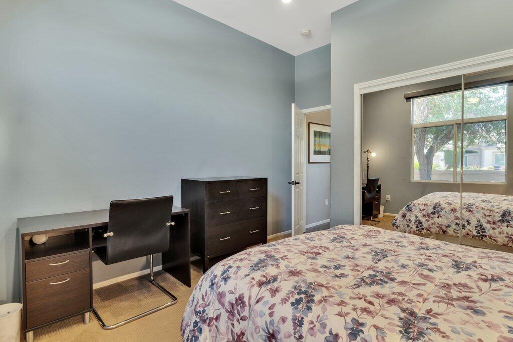 39357 Mirage Circle Palm Desert, CA 92211 - Photo 17 of 32 a bedroom with a bed and window