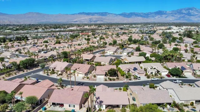 an aerial view of residential house with outdoor space