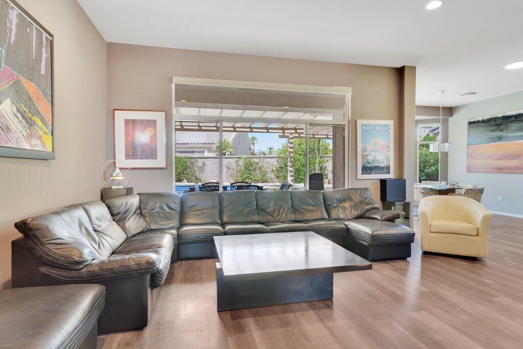 39357 Mirage Circle Palm Desert, CA 92211 - Photo 5 of 32 a living room with furniture and a large window