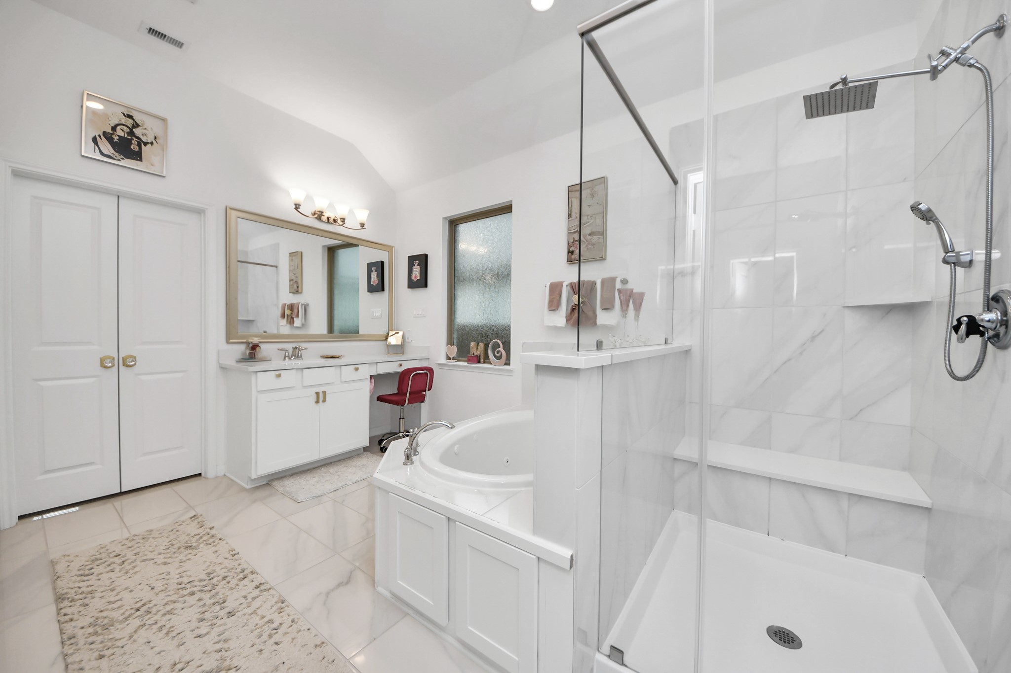 14948 Galileo Gates Drive Conroe, TX 77302 - Photo 19 of 30 a bathroom with a sink a tub and a shower