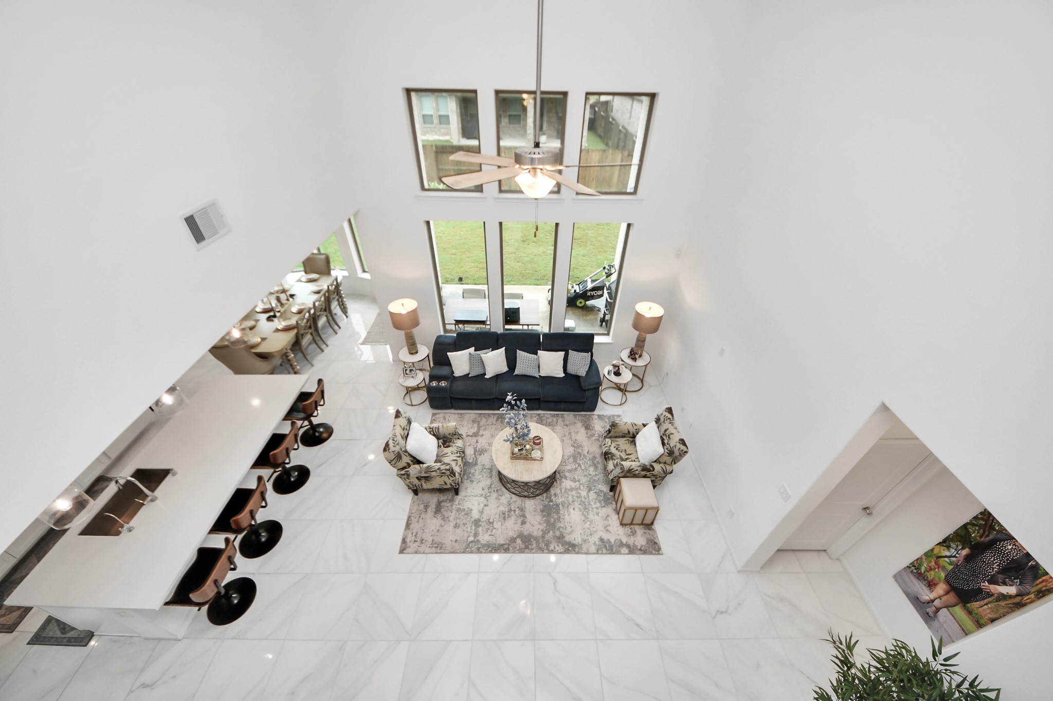 14948 Galileo Gates Drive Conroe, TX 77302 - Photo 27 of 30 a view of a dining room with furniture a chandelier and wooden floor