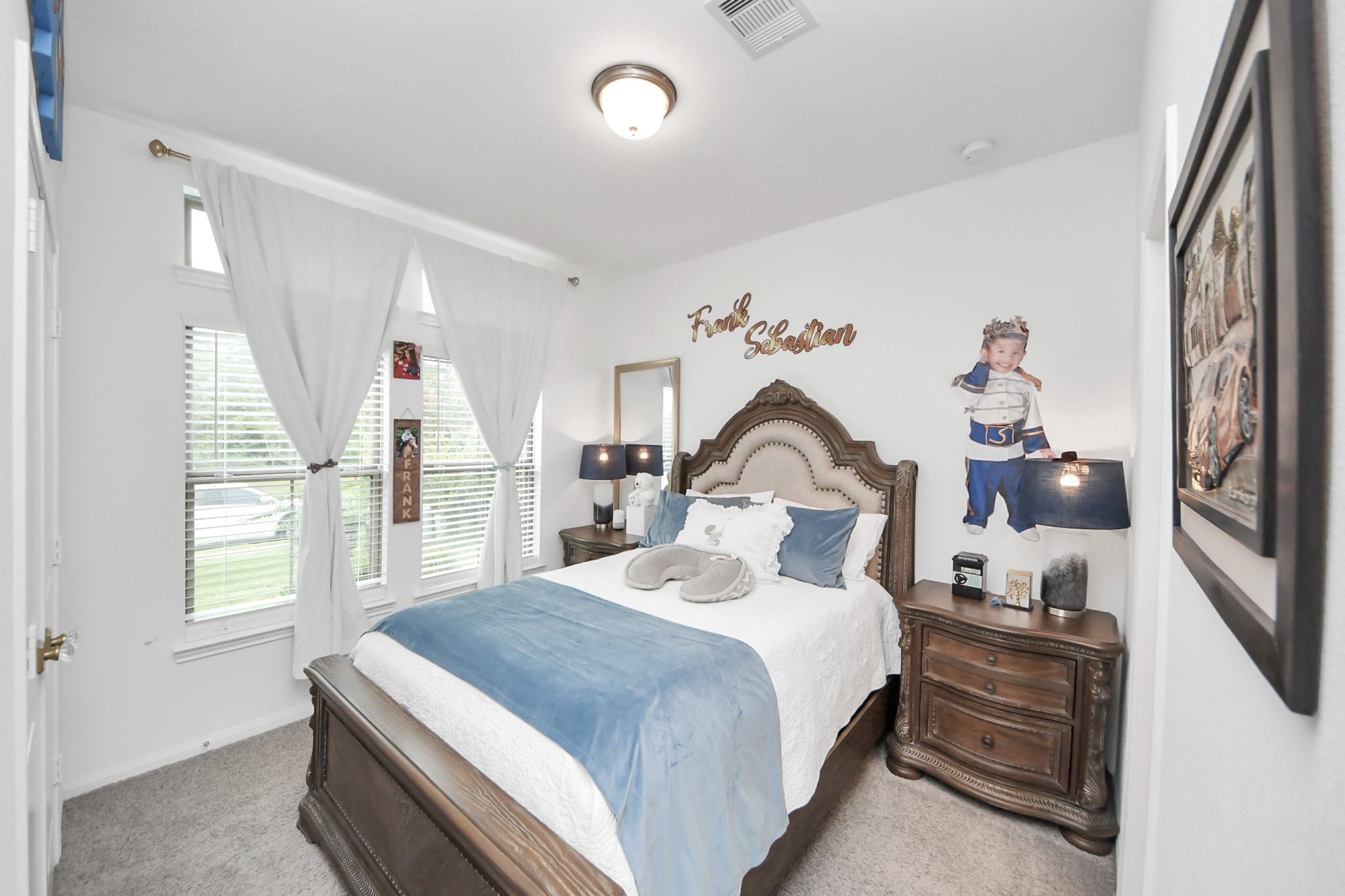 14948 Galileo Gates Drive Conroe, TX 77302 - Photo 5 of 30 a bedroom with a bed and a window
