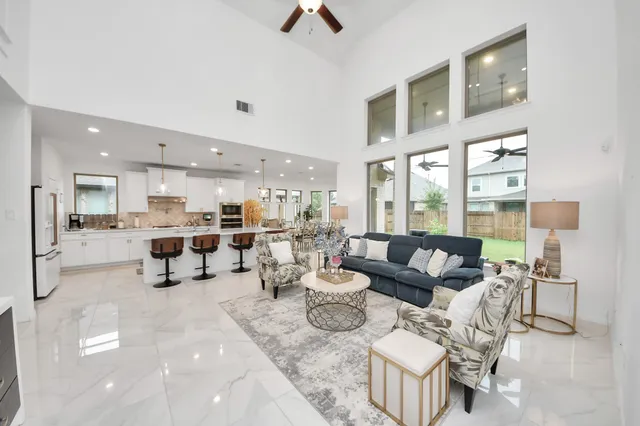 a living room with furniture and a table
