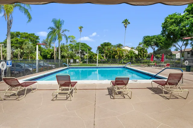 a view of outdoor space and swimming pool