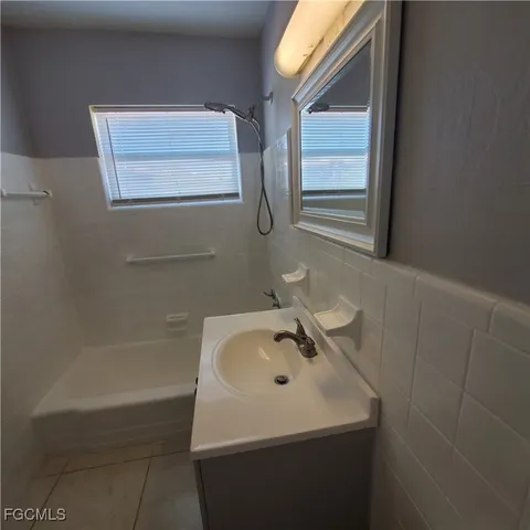 a bathroom with a sink and a bathtub
