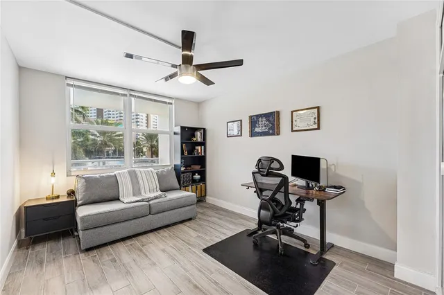 a view of a livingroom with a workspace