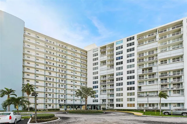 a view of a building with a street