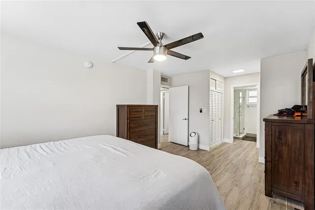 a balcony with furniture and large window