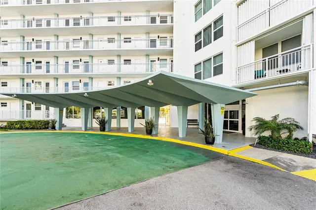 a view of a building with a swimming pool