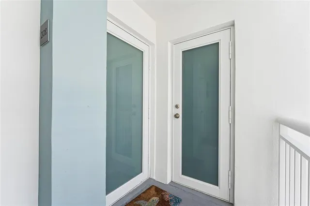 a kitchen with a table and chairs in it
