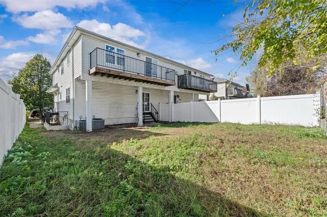 a front view of house with yard