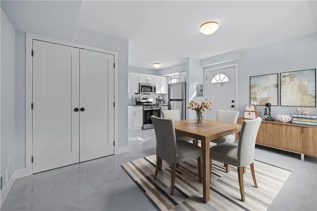 a view of a dining room with furniture