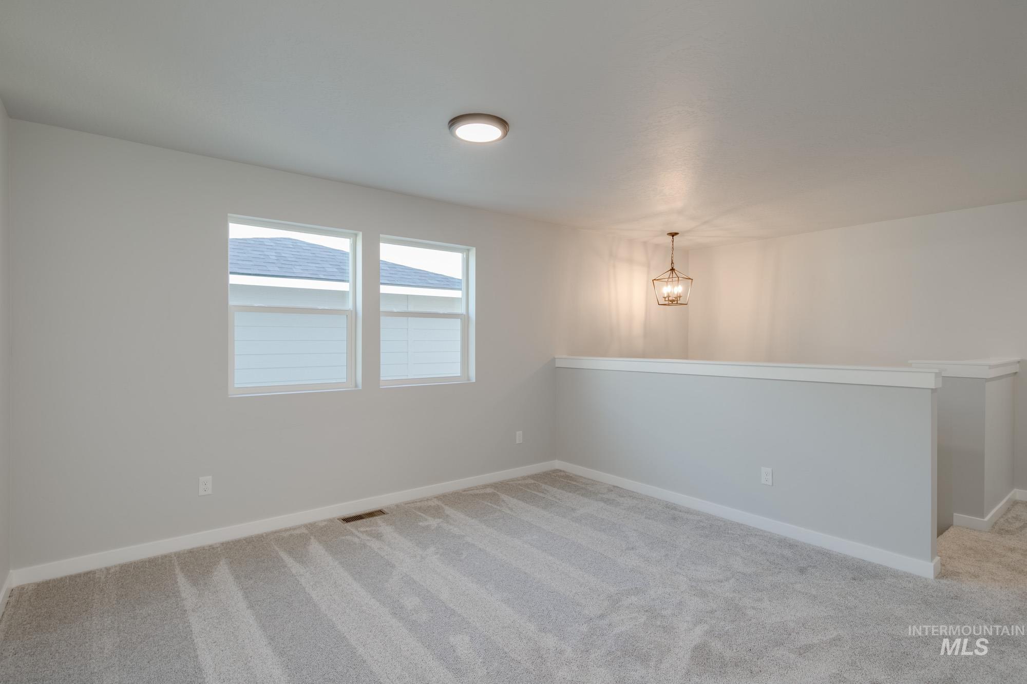 2058 South Border Way Meridian, ID 83642 - Photo 19 of 25 Spare room featuring light colored carpet