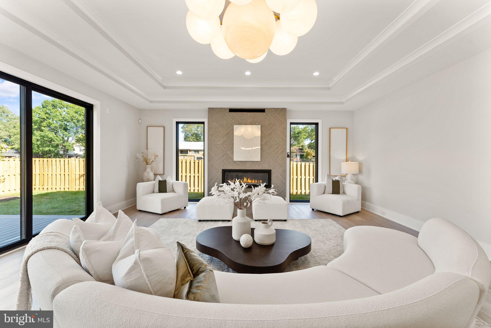 917 Timber Lane Southwest Vienna, VA 22180 - Photo 13 of 41 a living room with furniture and a large window