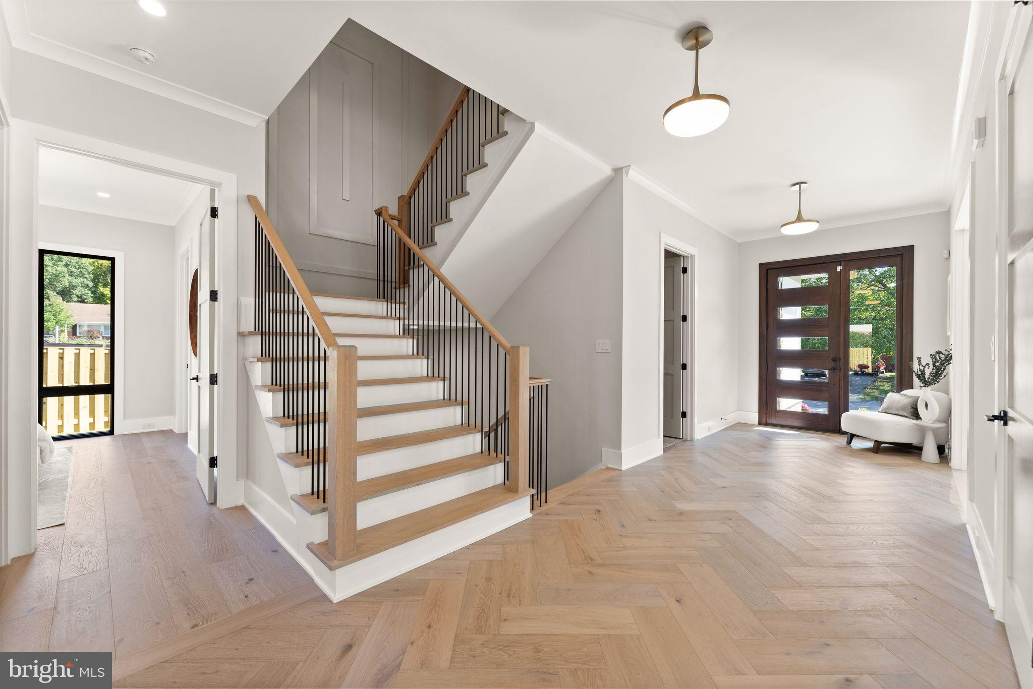 917 Timber Lane Southwest Vienna, VA 22180 - Photo 17 of 41 a view of a livingroom with wooden floor and stairs