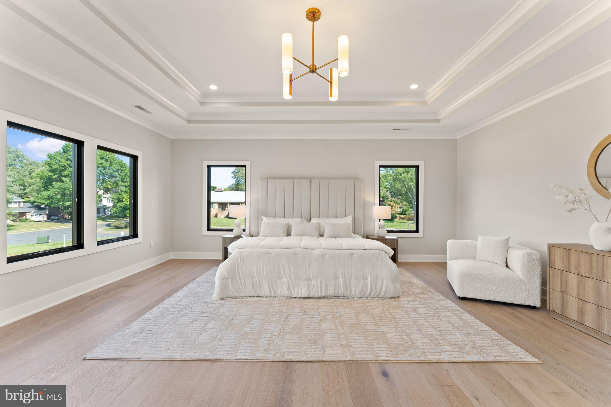 917 Timber Lane Southwest Vienna, VA 22180 - Photo 21 of 41 a spacious bedroom with a large bed and a couch