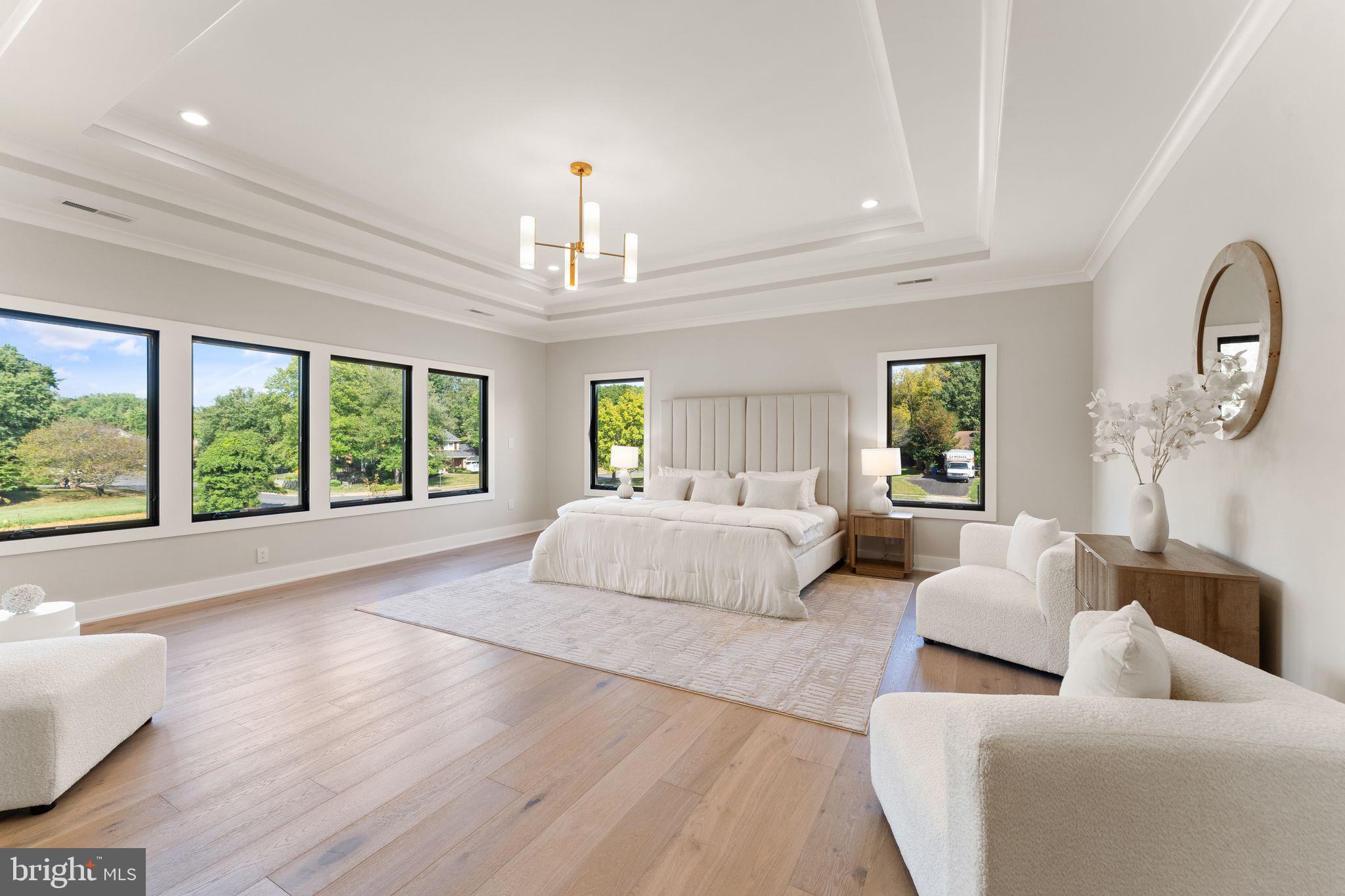 917 Timber Lane Southwest Vienna, VA 22180 - Photo 22 of 41 a living room with furniture and a chandelier