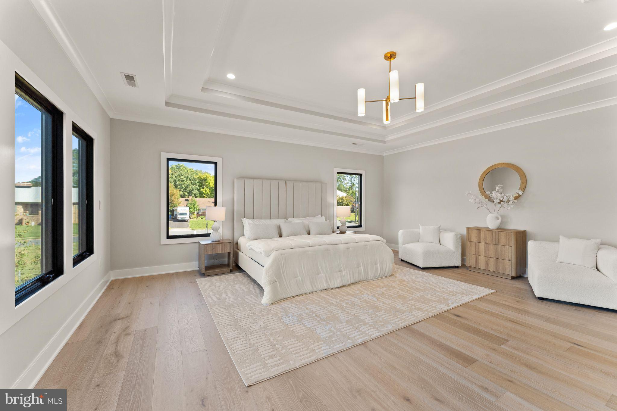917 Timber Lane Southwest Vienna, VA 22180 - Photo 23 of 41 a living room with furniture and a chandelier