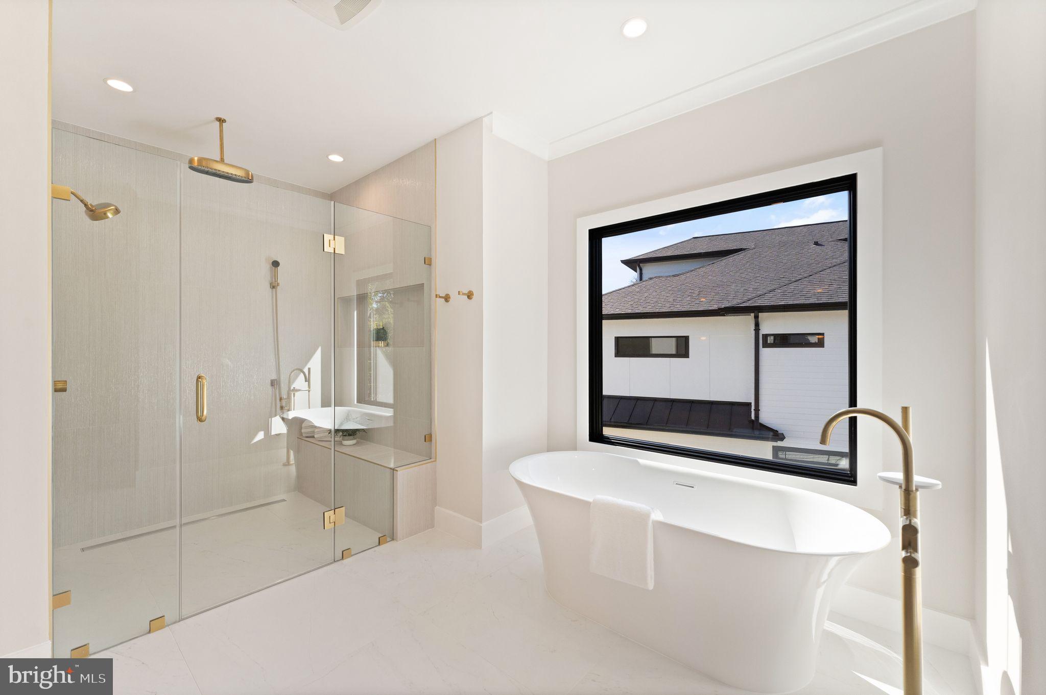 917 Timber Lane Southwest Vienna, VA 22180 - Photo 26 of 41 a bathroom with a sink a mirror and shower